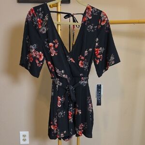 Trixxi Black Floral Wrap Romper with Red and Pink Flowers